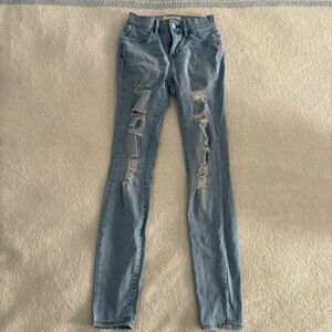 Women's Distressed Blue Jeans